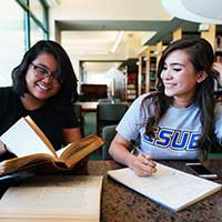 two students smiling